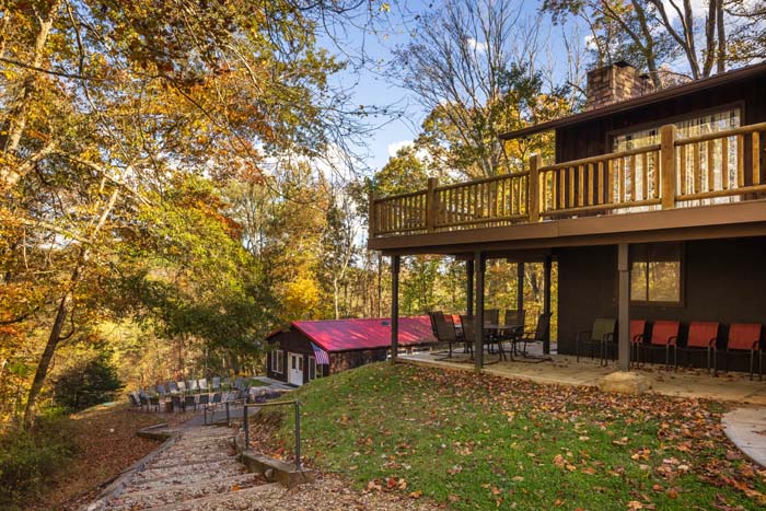 Upper deck and lawn with the pool house in the distance at High Point Lodge