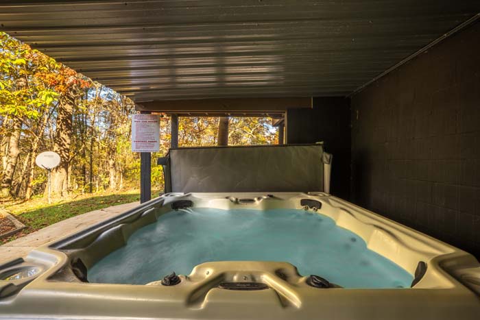 Covered hot tub under the deck at High Point Lodge