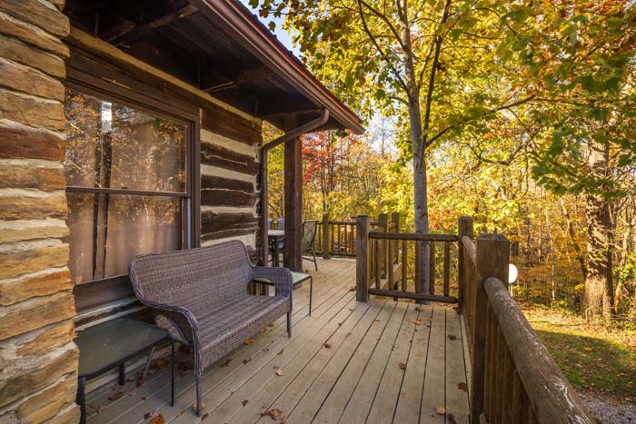 Porch bench on the log cabin deck at High Point Lodge