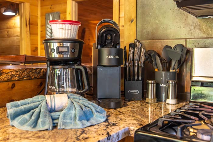 Coffee maker, Keurig and utensils on the kitchen counter at High Point Lodge
