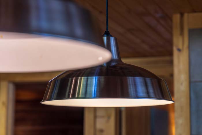 Black metal pendant light over the kitchen at High Point Lodge