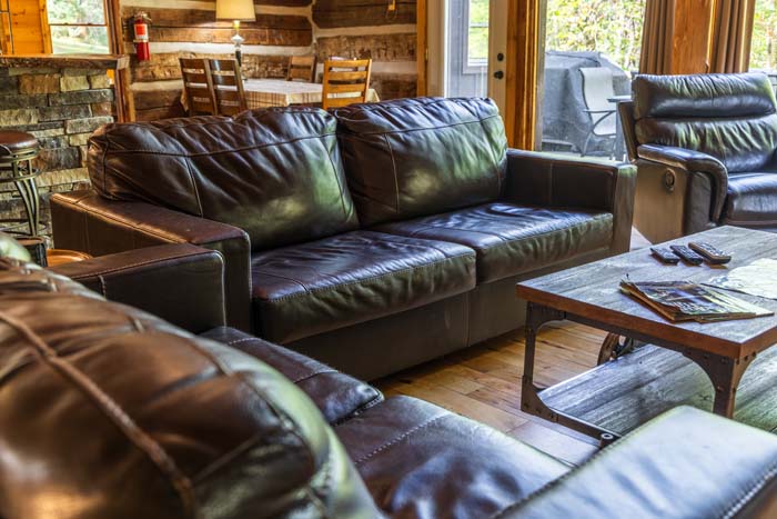 Leather sofas and coffee table in the great room at High Point Lodge
