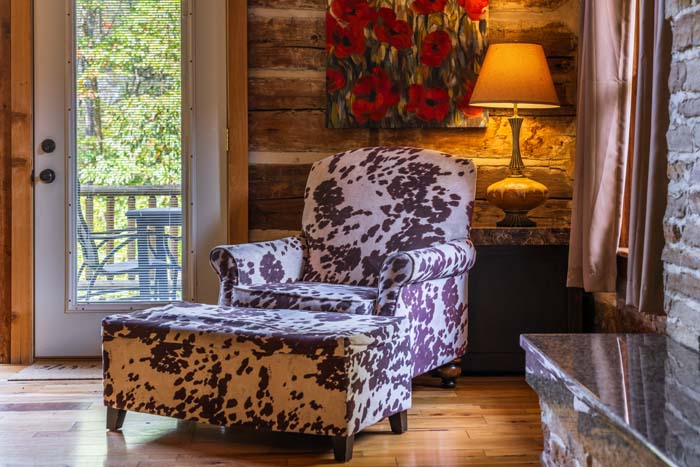 Accent chair and ottoman by the deck door at High Point Lodge
