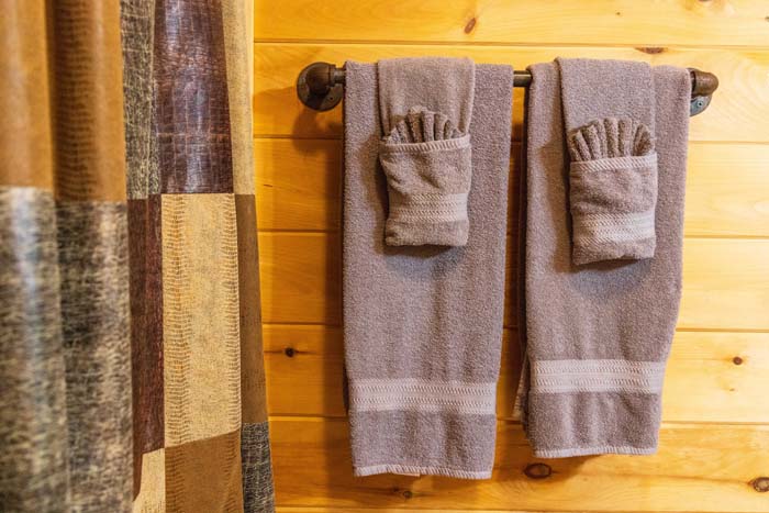 Bath towels hanging on a towel bar at High Point Lodge