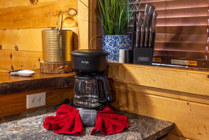 Coffee maker and knife block on the second kitchen counter at High Point Lodge