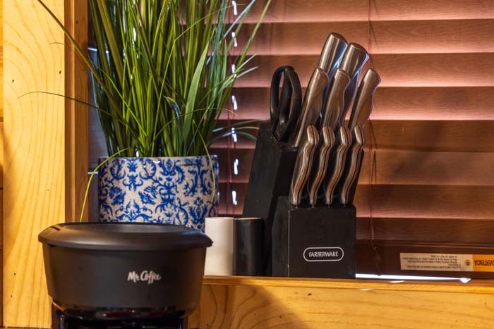 Knife block, plant and coffee maker at High Point Lodge